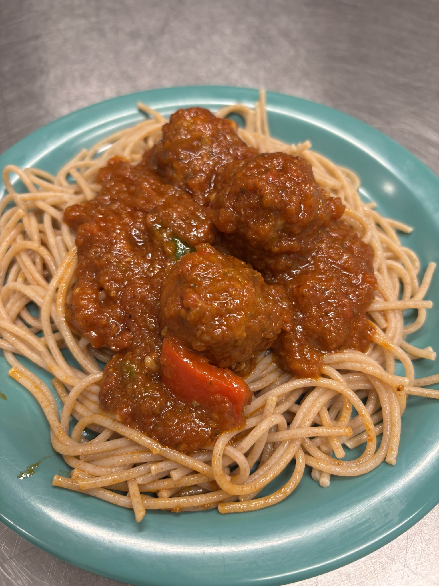Suqaar chicken over pasta